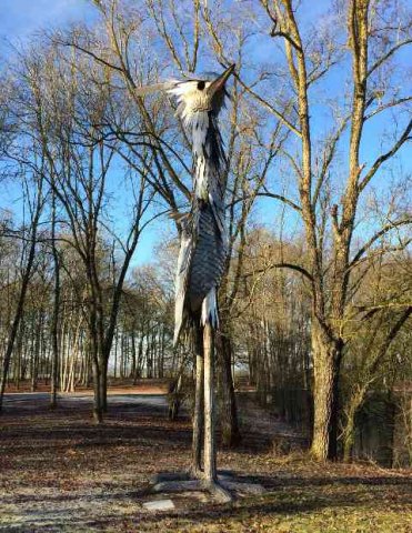 A huge metal grey heron, in an 'aire' on the A10 in France.